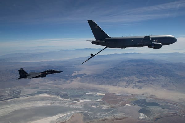 U.S. Air Force KC-46A Pegasus refueling an F-15, illustrating the tanker type cleared for possible sale to Qatar